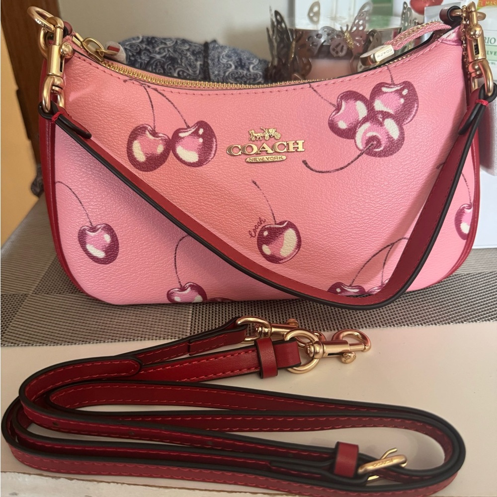 Pink Cherry print shoulder bag.